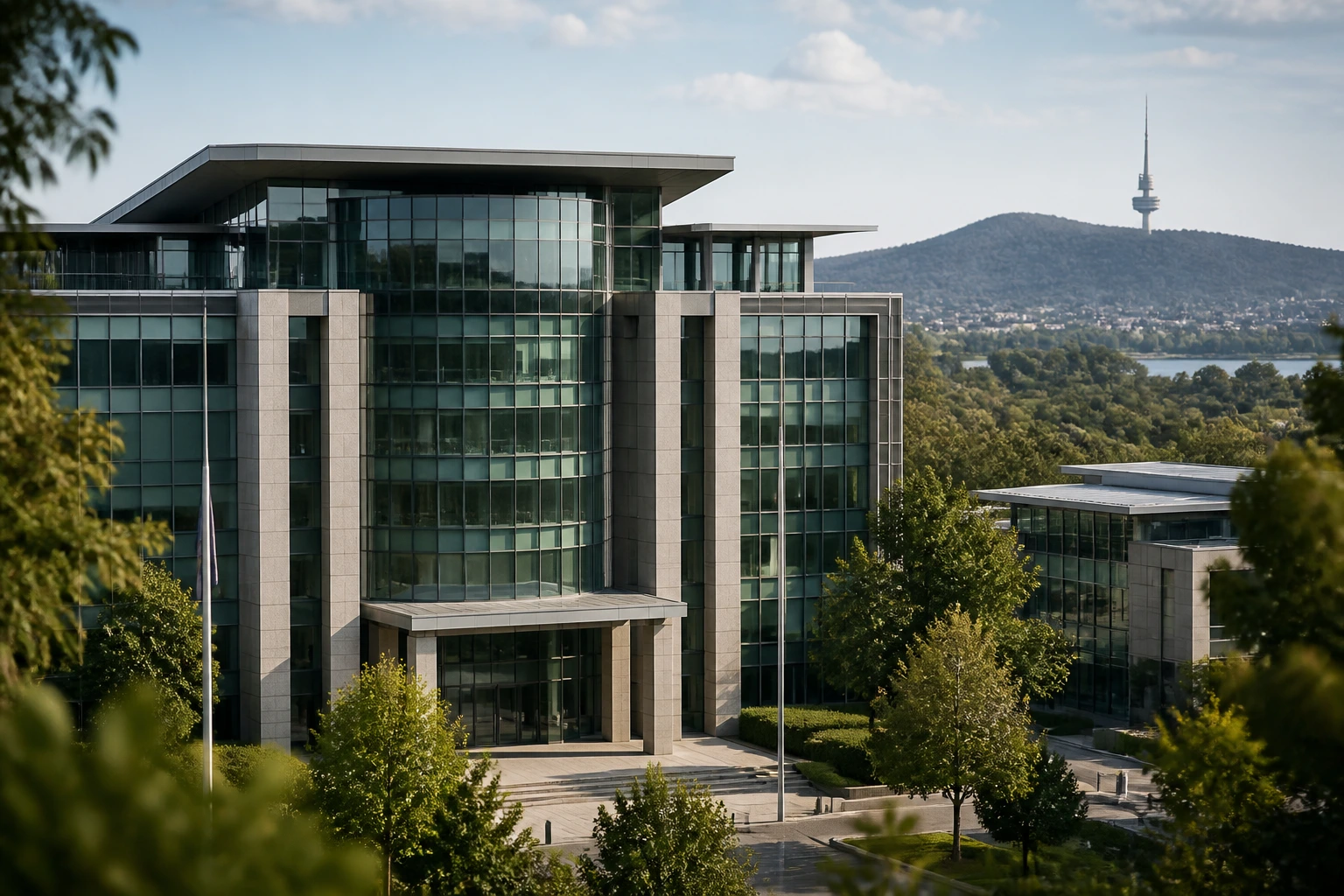 Close-up of a glass-front government office building in Canberra, symbolizing government contracting and specialized research