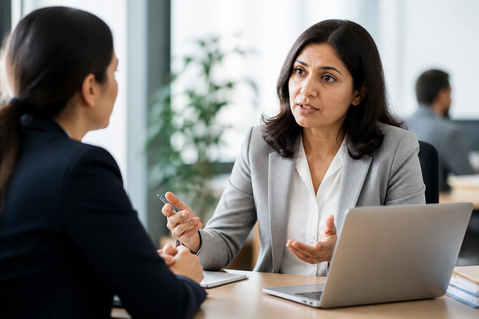 HR professional evaluating H-1B case viability in clinic setting