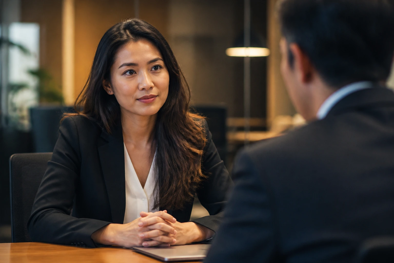 Portrait of candidate in interview setting discussing sponsorship