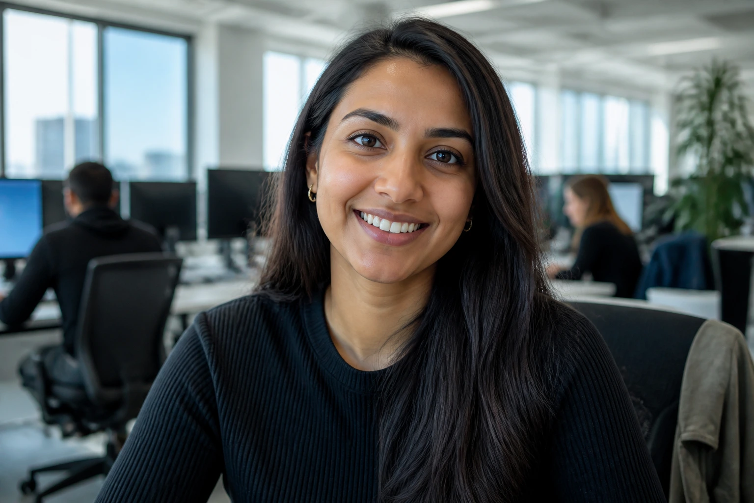 Portrait of a professional in a Microsoft-inspired tech office