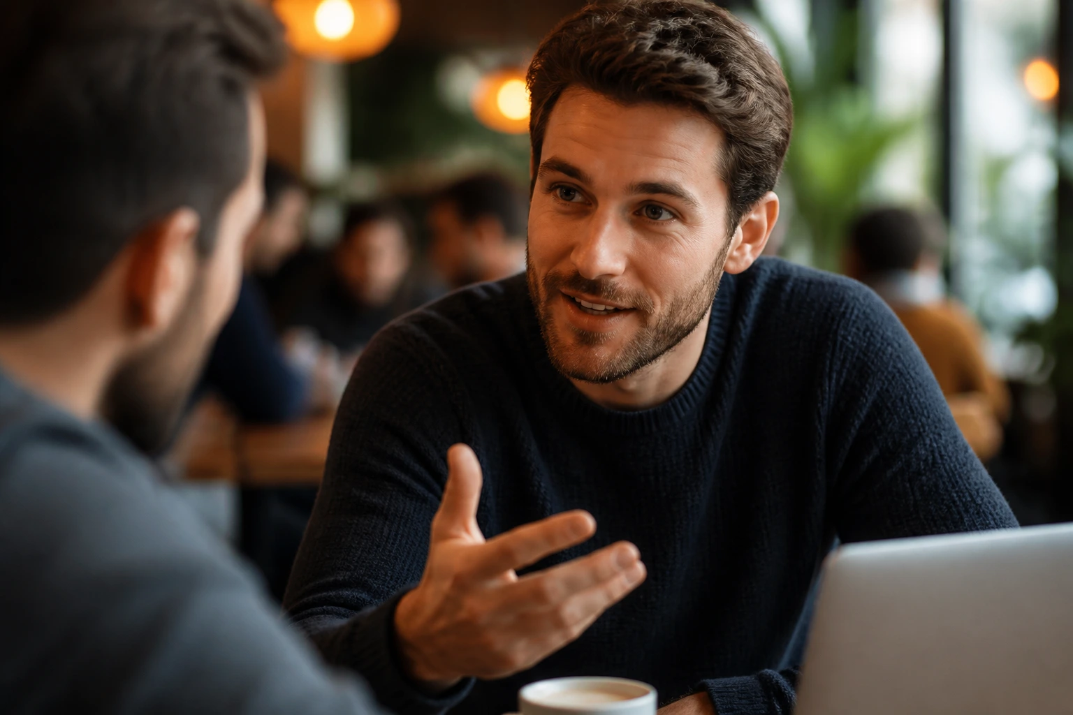 Person networking in a cafe, building professional connections in Australia.