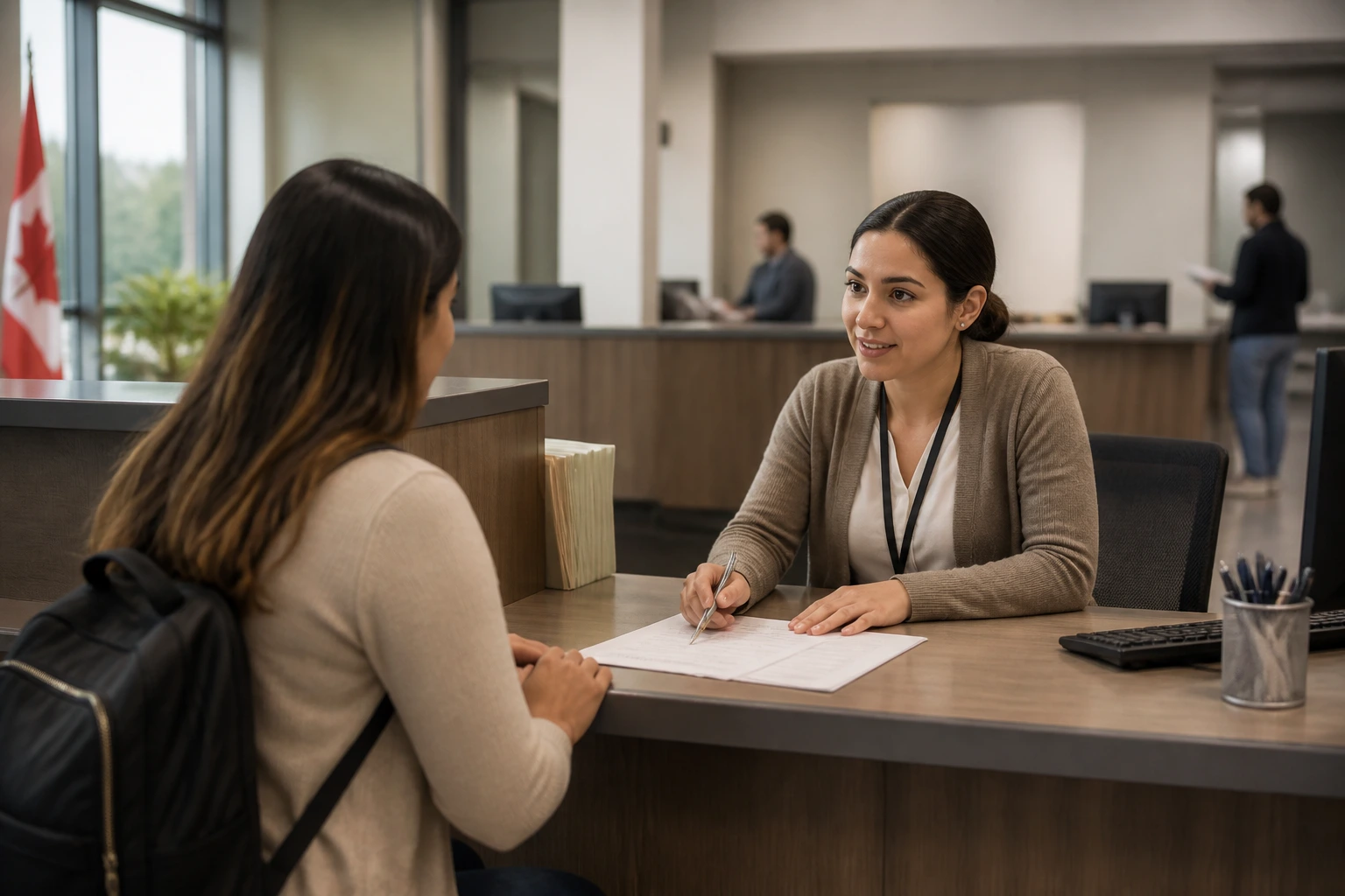 Office scene at a government registration desk assisting a job seeker