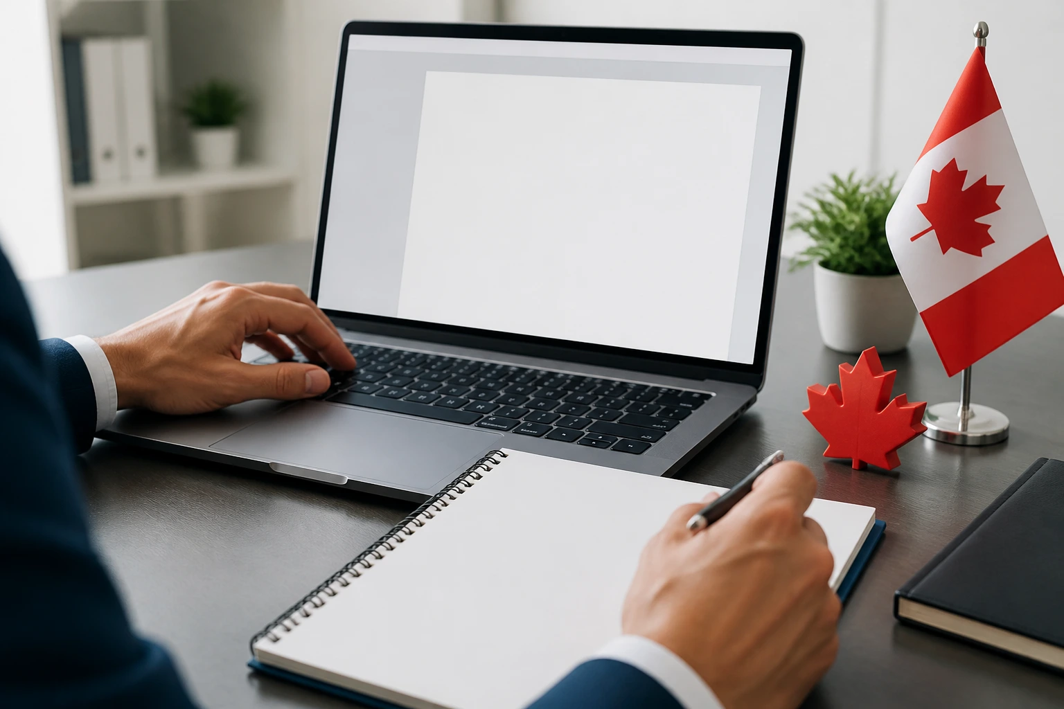 Hands on desk with blank resume draft on screen, illustrating Canadian resume style