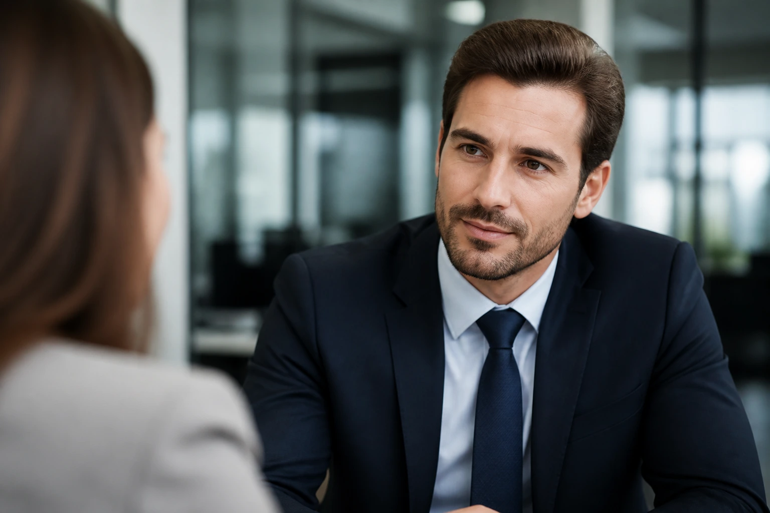 Portrait of a skilled insurer demonstrating strong sales and negotiation demeanor.