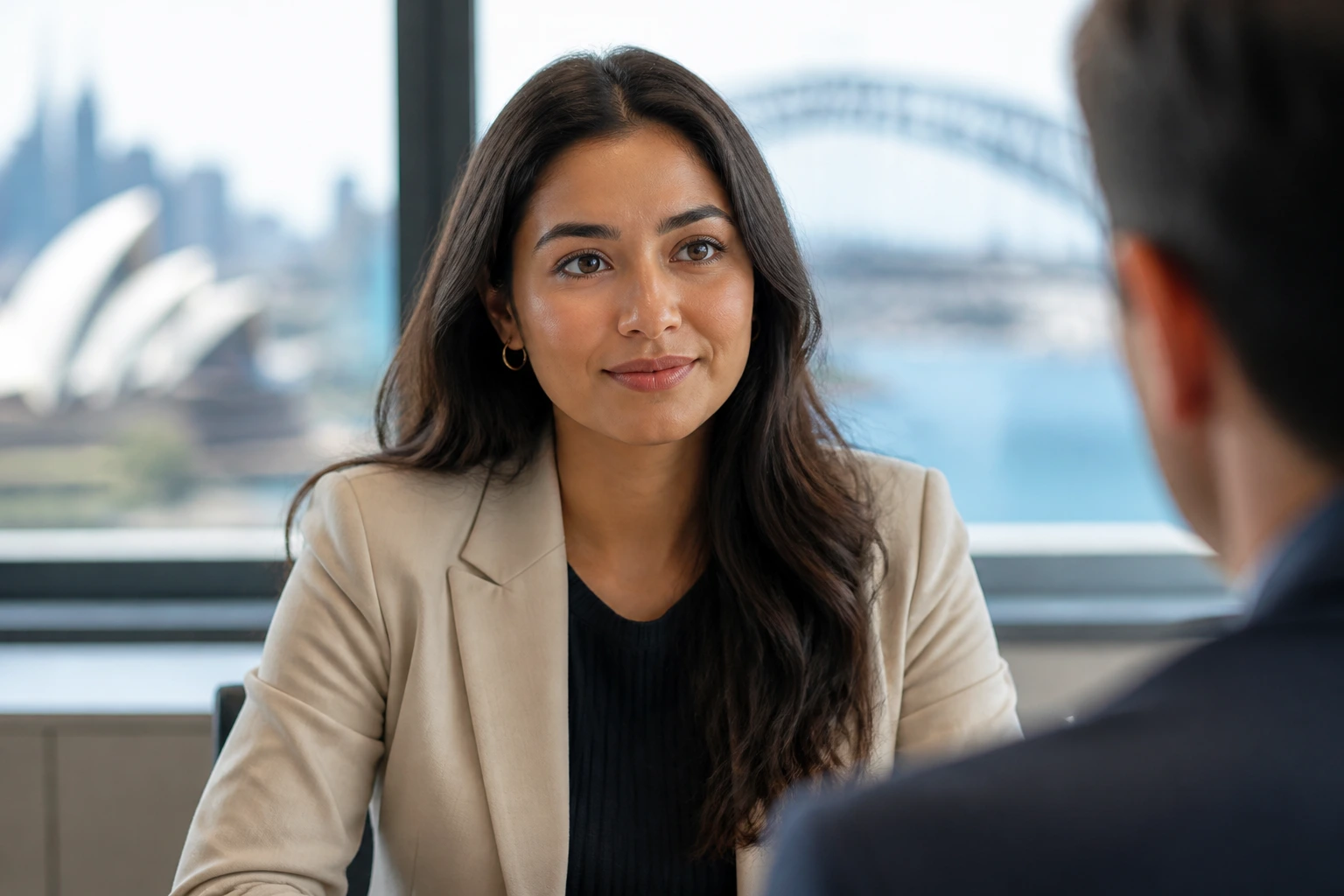 Close-up of confident interview candidate in modern office