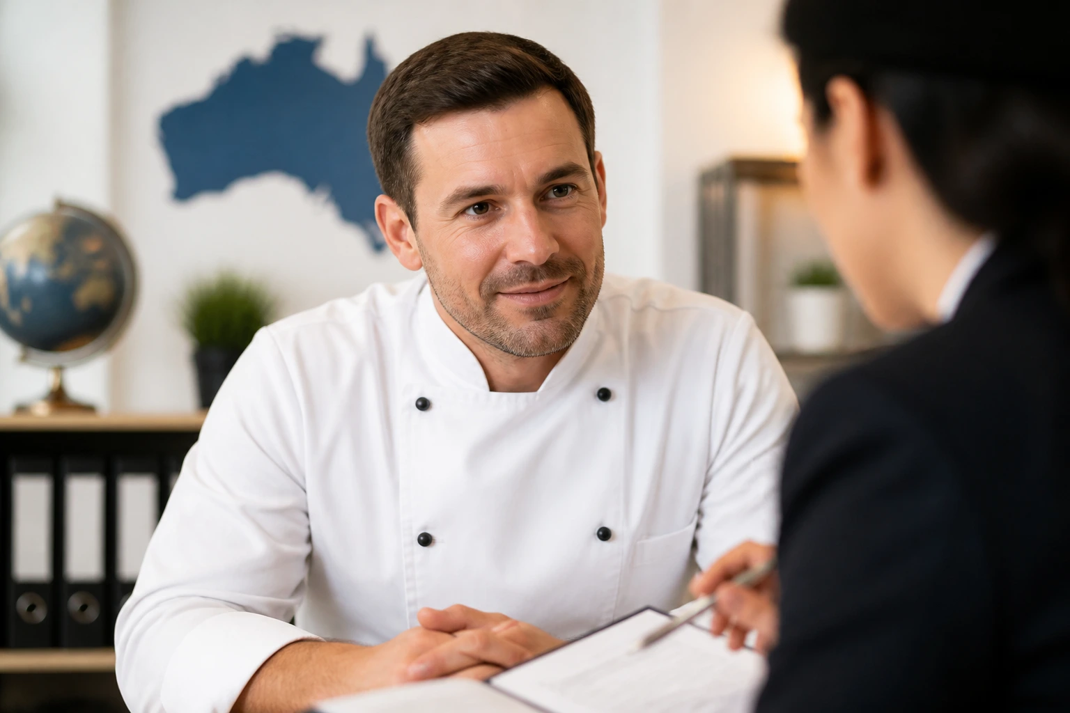 Chef portrait in a professional setting illustrating immigration guidance